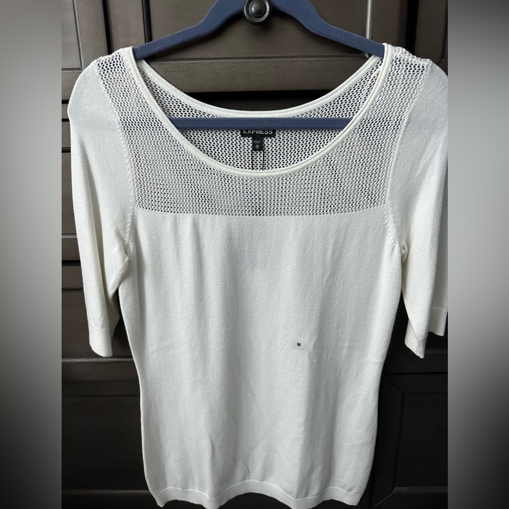 Express light weight soft sweater fabric. Winter white color. Size M.
